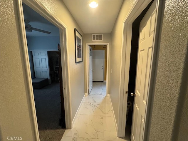 4605 Butterfield Way, Hemet, CA 92544 - hall featuring light marble finish floors and baseboards