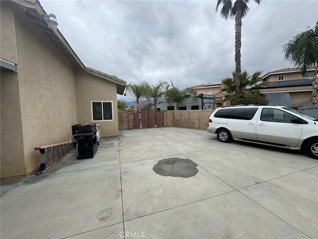 exterior space with a gate and fence
