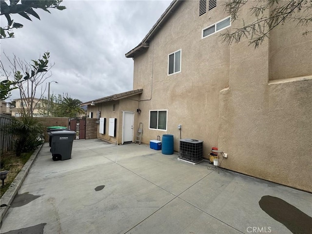 4605 Butterfield Way, Hemet, CA 92544 - back of property with stucco siding, a fenced backyard, and a patio area