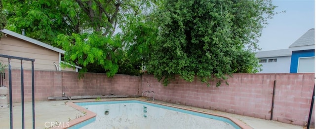 view of pool with a fenced in pool and a fenced backyard