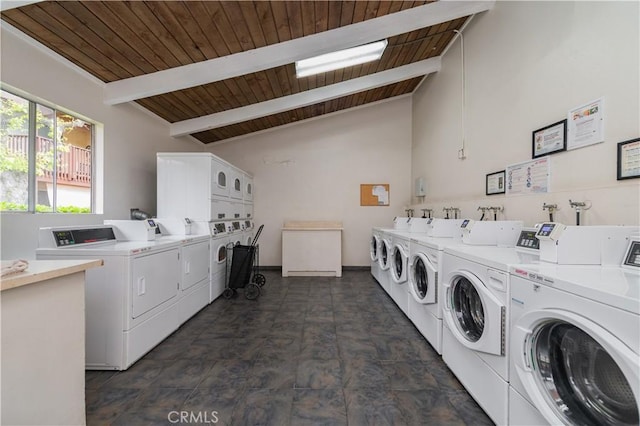 common laundry area with wood ceiling, stacked washer / drying machine, and washer and dryer