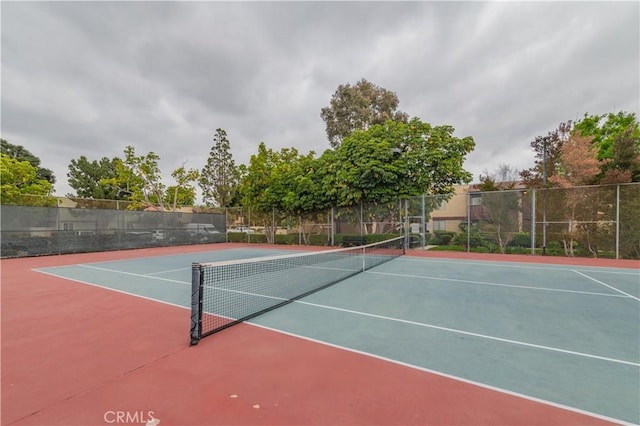 view of sport court with fence and community basketball court