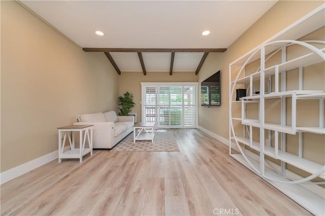 living room with baseboards, lofted ceiling with beams, recessed lighting, and wood finished floors