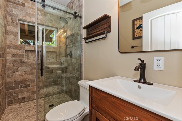 1119 Brentwood Dr, Lake Arrowhead, CA 92352 - full bath with vanity, toilet, and a shower stall