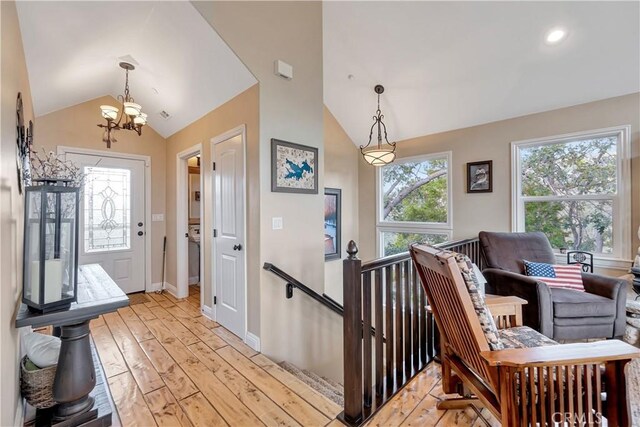 1119 Brentwood Dr, Lake Arrowhead, CA 92352 - foyer entrance featuring baseboards, recessed lighting, a chandelier, light wood finished floors, and vaulted ceiling