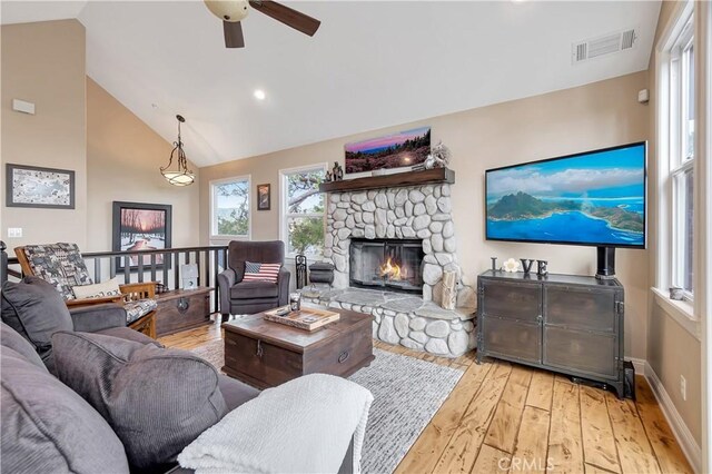 1119 Brentwood Dr, Lake Arrowhead, CA 92352 - living room with visible vents, wood-type flooring, a fireplace, baseboards, and a ceiling fan