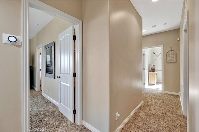 1119 Brentwood Dr, Lake Arrowhead, CA 92352 - corridor featuring baseboards and carpet flooring