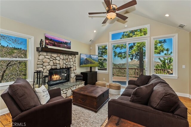 1119 Brentwood Dr, Lake Arrowhead, CA 92352 - living area featuring a fireplace, a ceiling fan, baseboards, wood finished floors, and visible vents