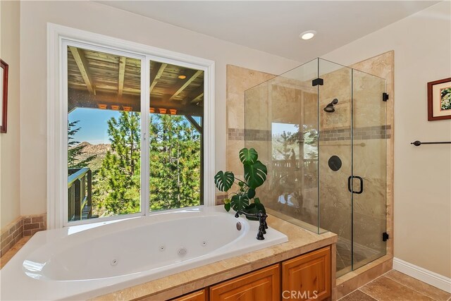 1119 Brentwood Dr, Lake Arrowhead, CA 92352 - full bathroom with a shower stall, a whirlpool tub, and tile patterned floors