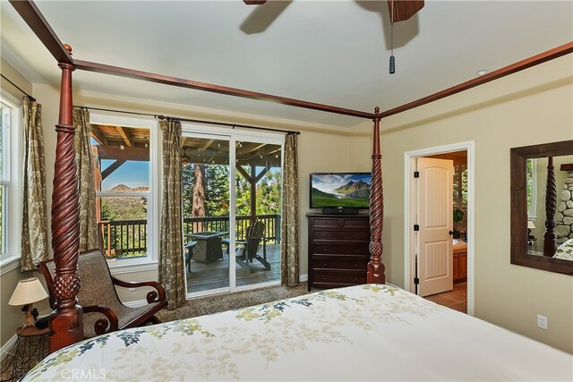 1119 Brentwood Dr, Lake Arrowhead, CA 92352 - bedroom with access to exterior, multiple windows, baseboards, and ensuite bathroom