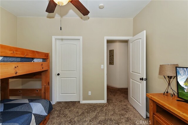 1119 Brentwood Dr, Lake Arrowhead, CA 92352 - bedroom with carpet, baseboards, and a ceiling fan