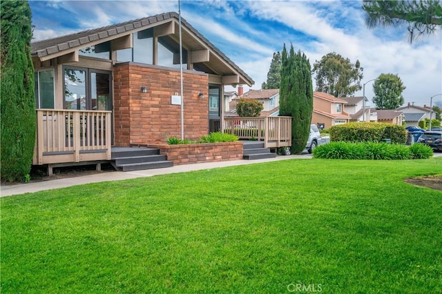 8913 La Dona Ct, Fountain Valley, CA 92708 - rear view of house featuring a lawn and a deck
