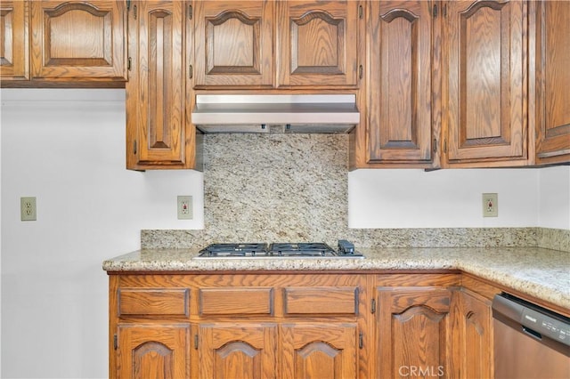 8913 La Dona Ct, Fountain Valley, CA 92708 - kitchen featuring decorative backsplash, light stone countertops, brown cabinets, appliances with stainless steel finishes, and exhaust hood