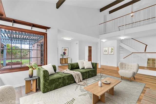 8913 La Dona Ct, Fountain Valley, CA 92708 - living room featuring beam ceiling, wood finished floors, and high vaulted ceiling