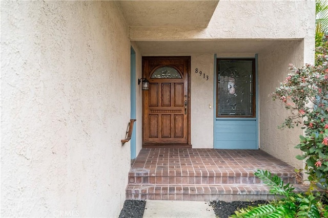8913 La Dona Ct, Fountain Valley, CA 92708 - view of exterior entry with stucco siding