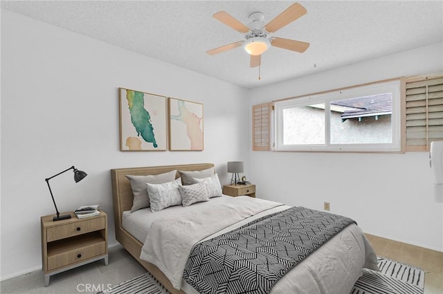 8913 La Dona Ct, Fountain Valley, CA 92708 - bedroom featuring a ceiling fan, a textured ceiling, baseboards, and carpet