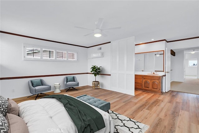 8913 La Dona Ct, Fountain Valley, CA 92708 - bedroom featuring a sink, ornamental molding, and light wood-style flooring