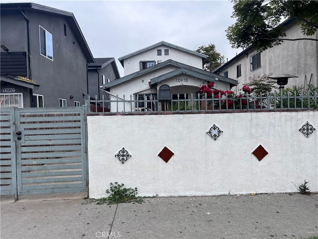 view of gate featuring fence private yard