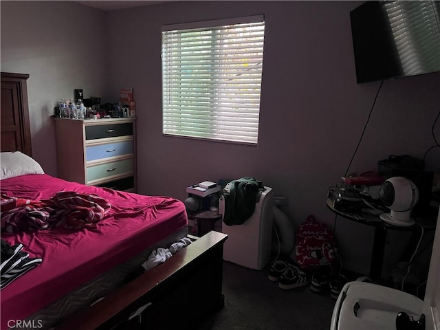 bedroom featuring carpet