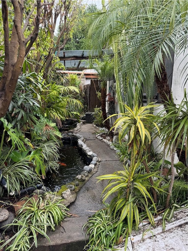 1960 Olive Way, Pasadena, CA 91104 - view of yard featuring a garden pond and fence
