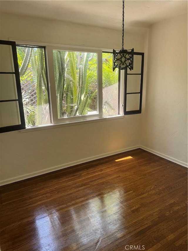 1960 Olive Way, Pasadena, CA 91104 - spare room featuring plenty of natural light, a chandelier, wood finished floors, and baseboards