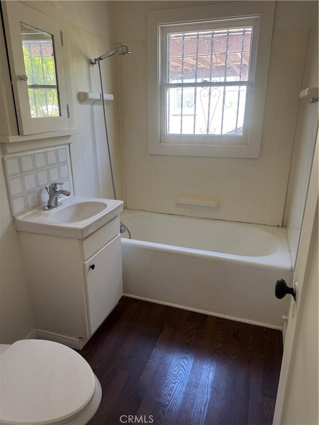 1960 Olive Way, Pasadena, CA 91104 - full bathroom featuring wood finished floors, shower / washtub combination, healthy amount of natural light, and backsplash
