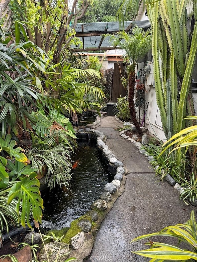 1960 Olive Way, Pasadena, CA 91104 - view of yard with a garden pond and fence