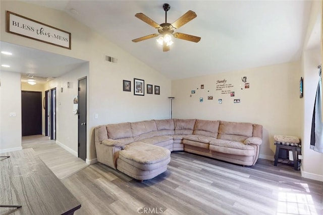 3003 Corinne Ct, Live Oak, CA 95953 - living room featuring light wood-style floors, a ceiling fan, baseboards, and high vaulted ceiling