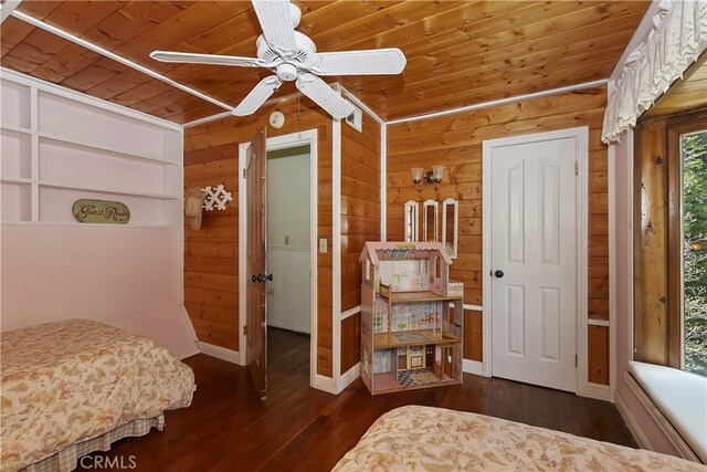 242 Holiday Dr, Lake Arrowhead, CA 92352 - bedroom with wooden ceiling, wood walls, wood-type flooring, and ceiling fan