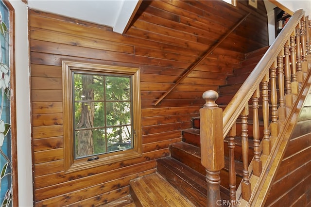 242 Holiday Dr, Lake Arrowhead, CA 92352 - staircase with wood walls and beam ceiling