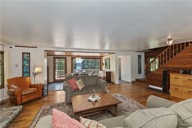 242 Holiday Dr, Lake Arrowhead, CA 92352 - living room featuring baseboards, stairs, and wood finished floors