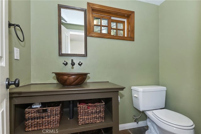 242 Holiday Dr, Lake Arrowhead, CA 92352 - bathroom with baseboards, a sink, and toilet