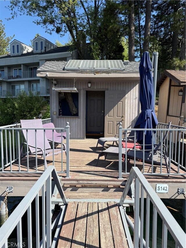 242 Holiday Dr, Lake Arrowhead, CA 92352 - wooden terrace featuring a storage shed