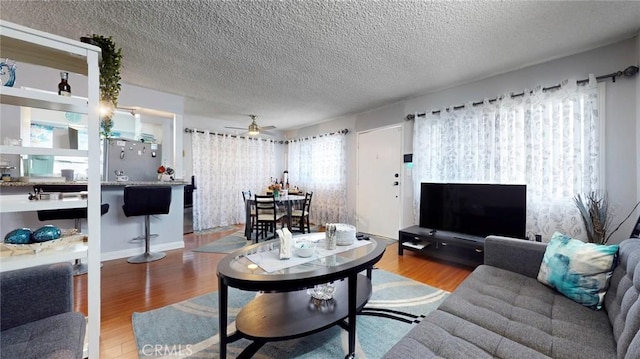 330 N Howard St Unit 212, Glendale, CA 91206 - living room featuring a ceiling fan, a textured ceiling, and wood finished floors