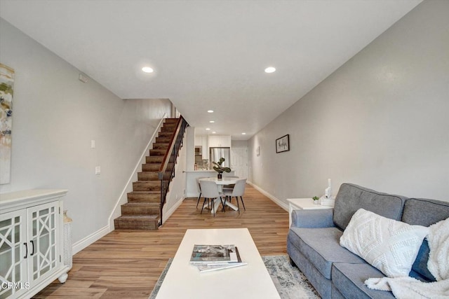 385 E Surfside Dr, Port Hueneme, CA 93041 - living area featuring recessed lighting, baseboards, light wood finished floors, and stairs