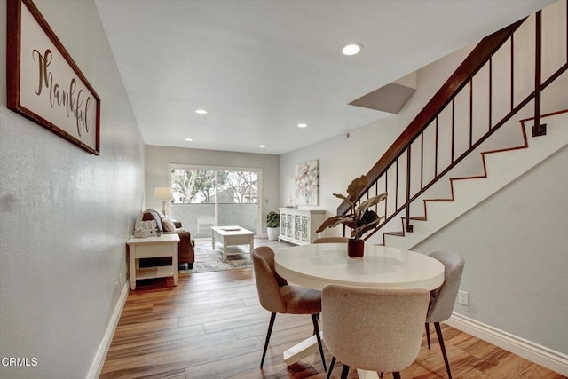 385 E Surfside Dr, Port Hueneme, CA 93041 - dining room with recessed lighting, baseboards, wood finished floors, and stairway