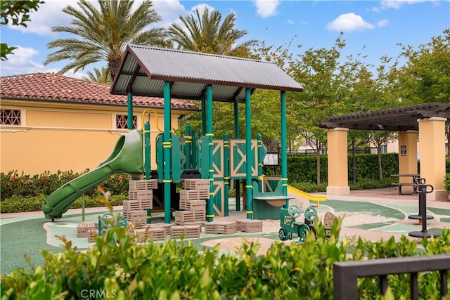 community jungle gym featuring a pergola