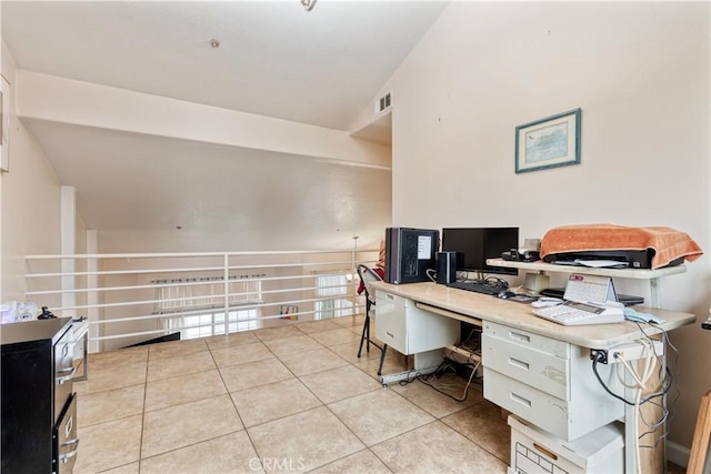 office space with light tile patterned flooring