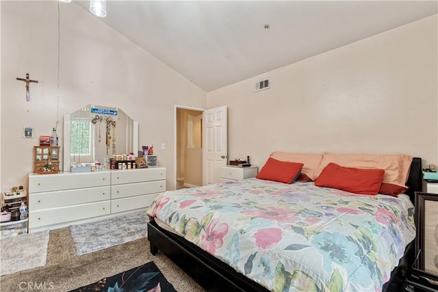 bedroom featuring carpet flooring and high vaulted ceiling