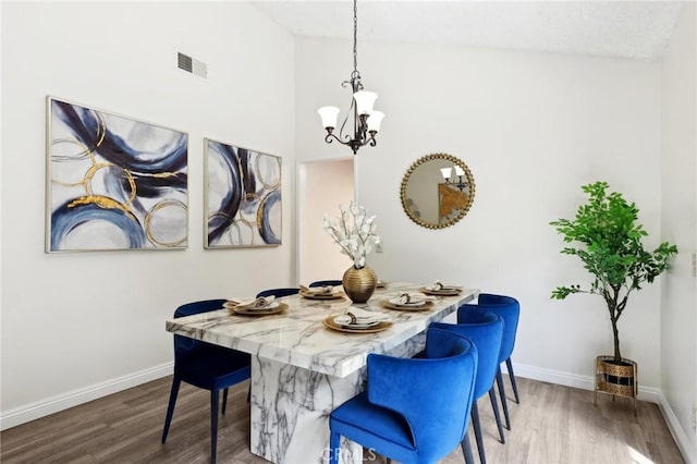 20905 Trigger Ln, Diamond Bar, CA 91765 - dining area with wood finished floors, a chandelier, and baseboards