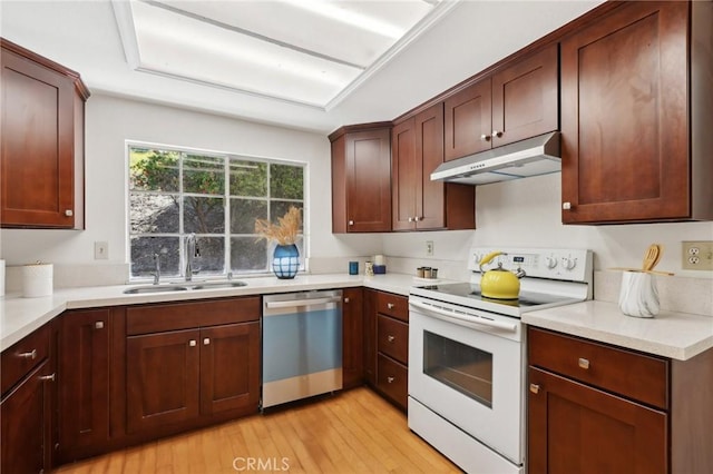 20905 Trigger Ln, Diamond Bar, CA 91765 - kitchen featuring white range with electric stovetop, stainless steel dishwasher, under cabinet range hood, a sink, and light wood finished floors