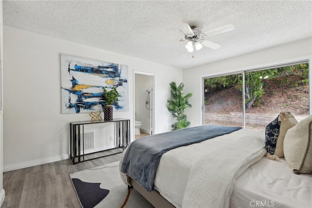 20905 Trigger Ln, Diamond Bar, CA 91765 - bedroom with wood finished floors, a textured ceiling, baseboards, ensuite bath, and a ceiling fan