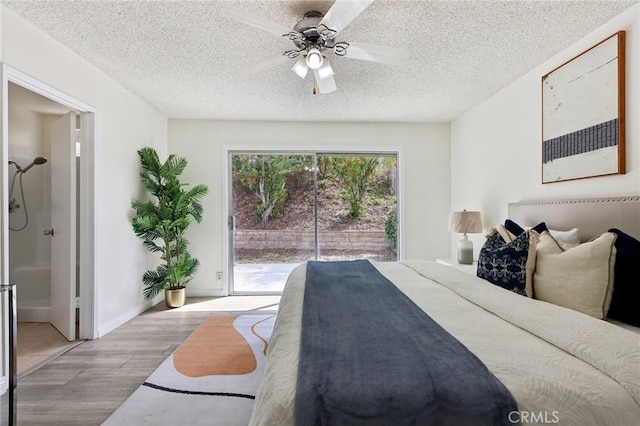 20905 Trigger Ln, Diamond Bar, CA 91765 - bedroom featuring access to exterior, wood finished floors, a textured ceiling, connected bathroom, and ceiling fan