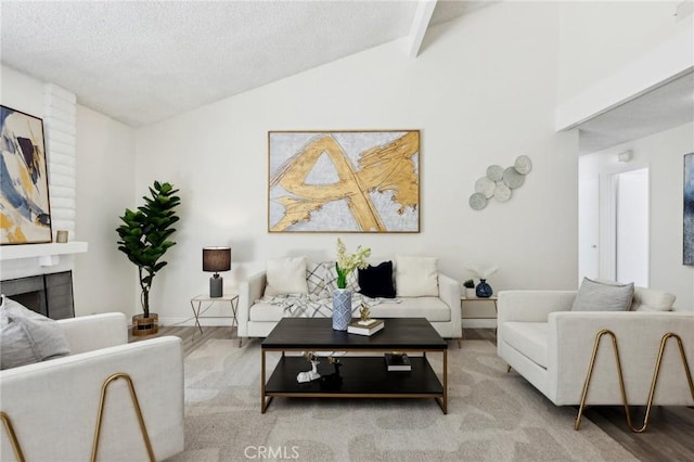 20905 Trigger Ln, Diamond Bar, CA 91765 - living area with a textured ceiling, a fireplace, and carpet