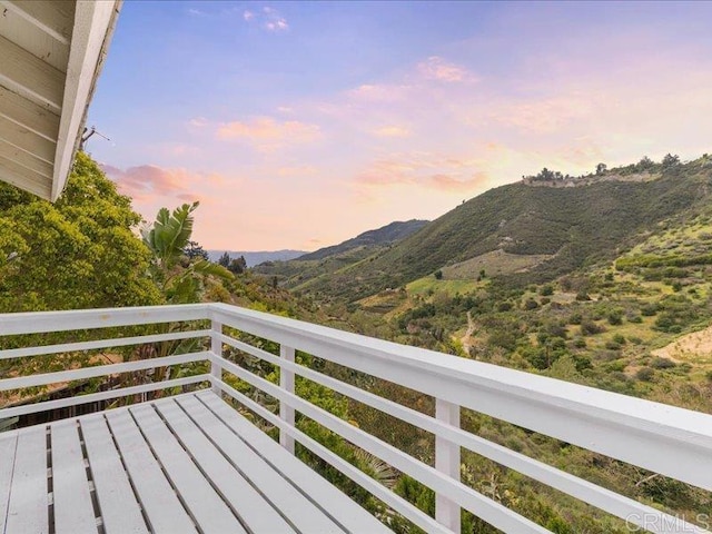 balcony featuring a mountain view