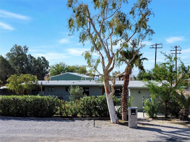 view of front of home with fence