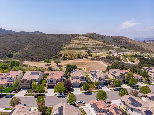 aerial view with a mountain view and a residential view