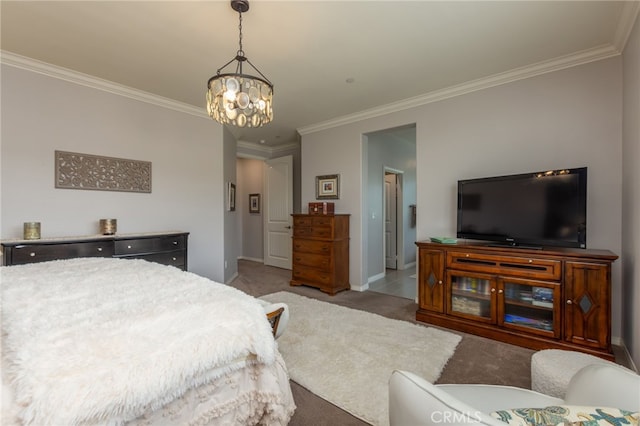 carpeted bedroom featuring crown molding, baseboards, and an inviting chandelier