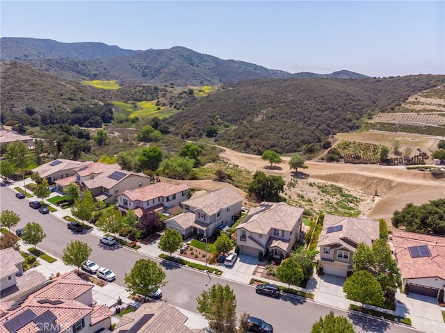 birds eye view of property featuring a mountain view and a residential view