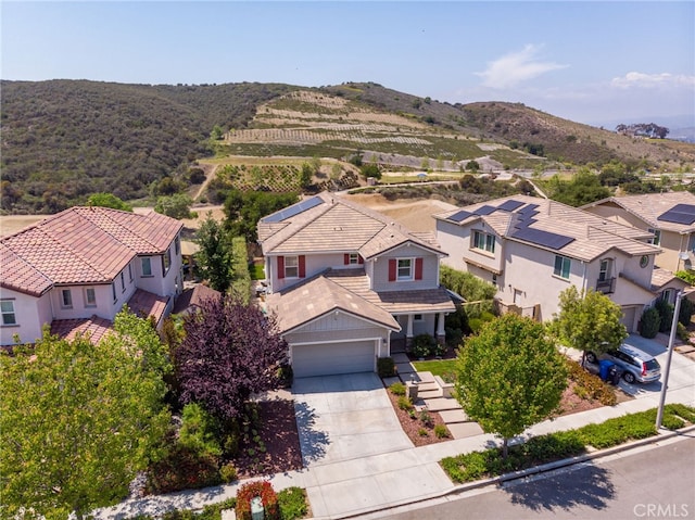 birds eye view of property featuring a residential view and a mountain view